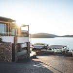 Elegant modern house by the lake with stunning sunrise view. Ideal real estate.